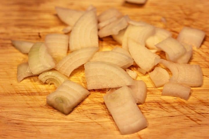 sliced onions on cutting board