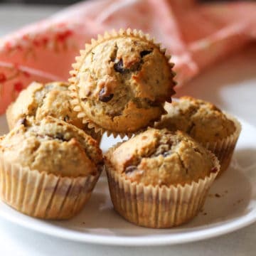 Muffins on a white plate.