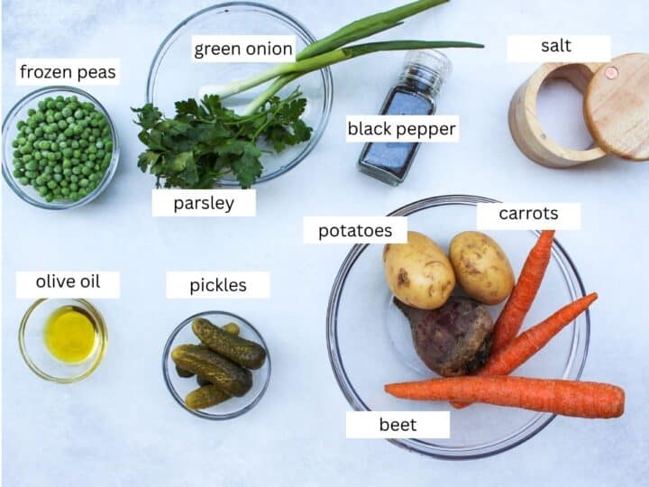 Ingredients on a white background for making Ukrainian beet salad Vinegret.