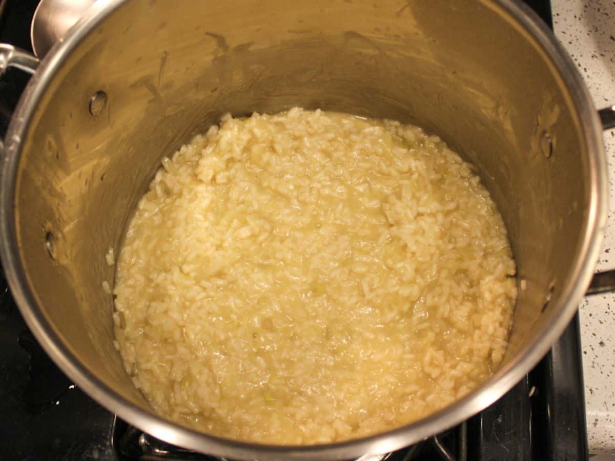 Creamy fennel risotto in a large wide pot.