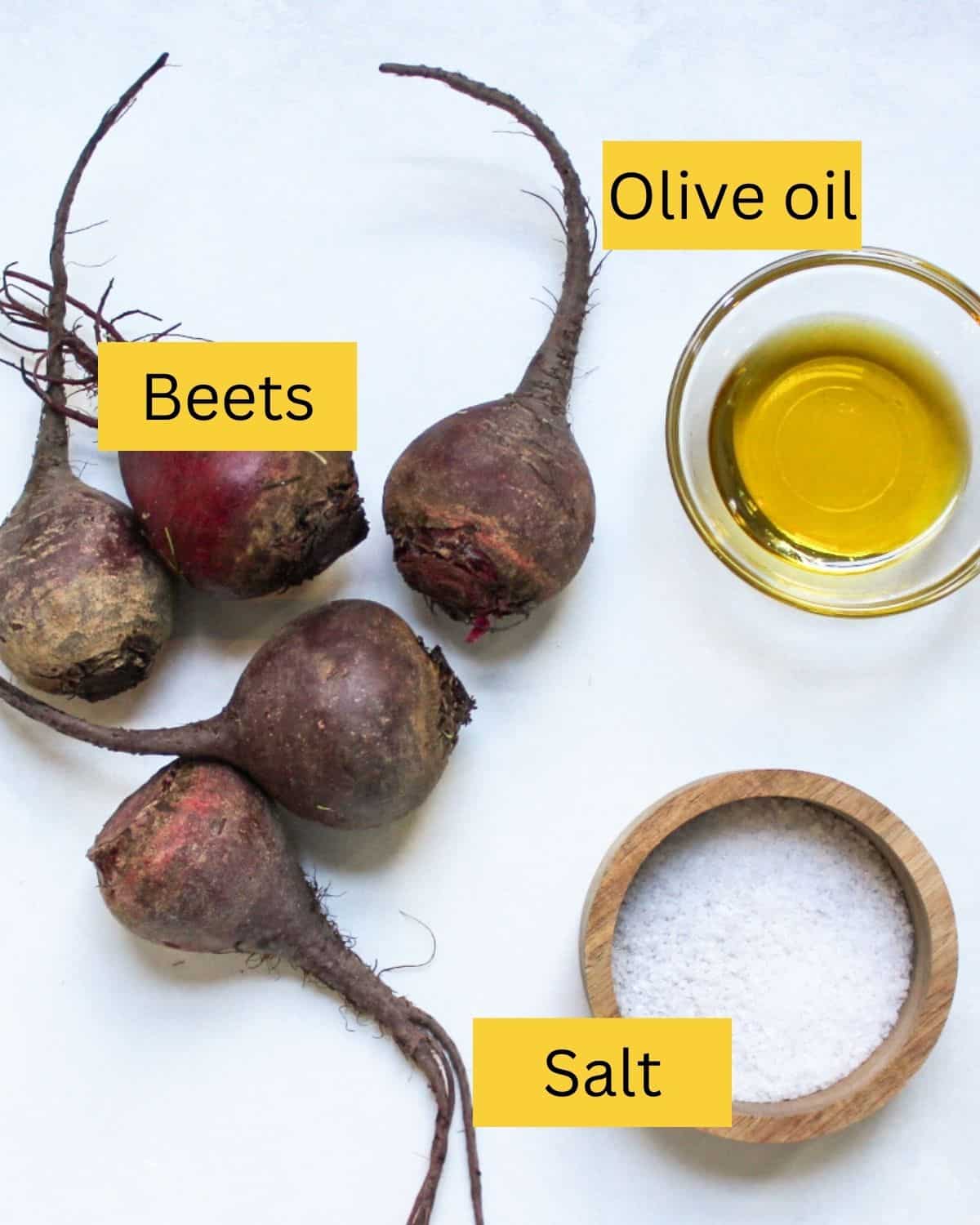 Recipe ingredients on a white background labeled as beets, olive oil, salt.