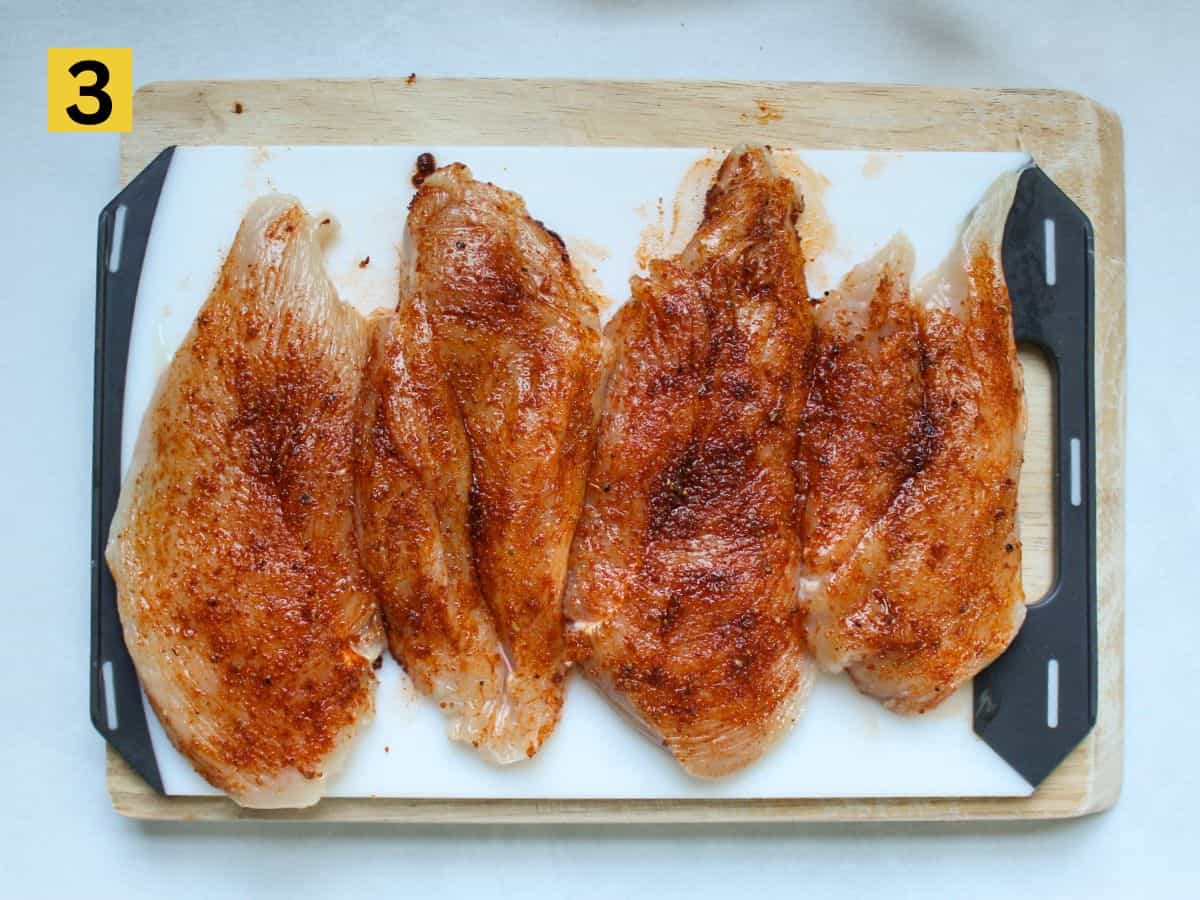 Thin sliced chicken breasts seasoned with the spiced mix.