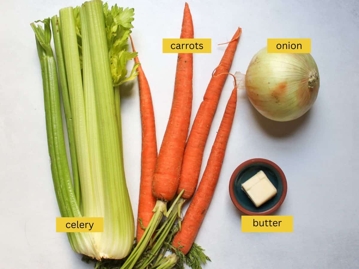 French mirepoix ingredients made with onion, carrots, celery and butter.