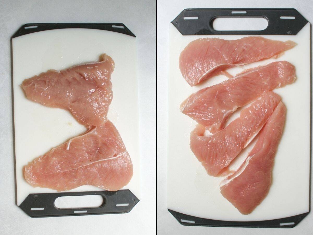 Slicing large turkey breast into thin cutlets on a plastic cutting board to make turkey steaks.
