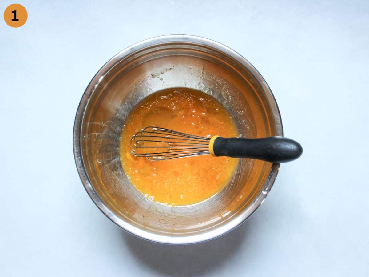 Eggs, sugar and melted butter or oil mixed in a large bowl with a whisk. 