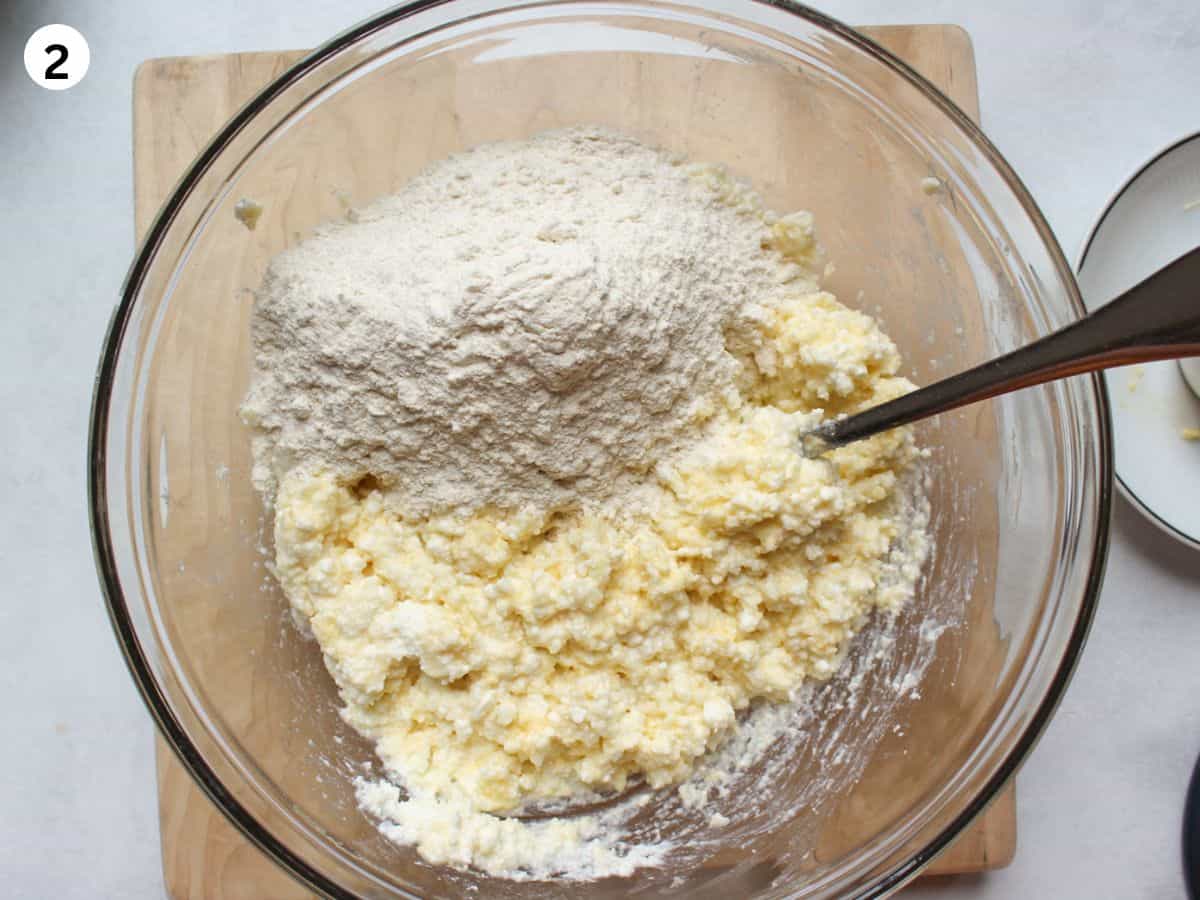 Adding flour and baking powder to the mix. 