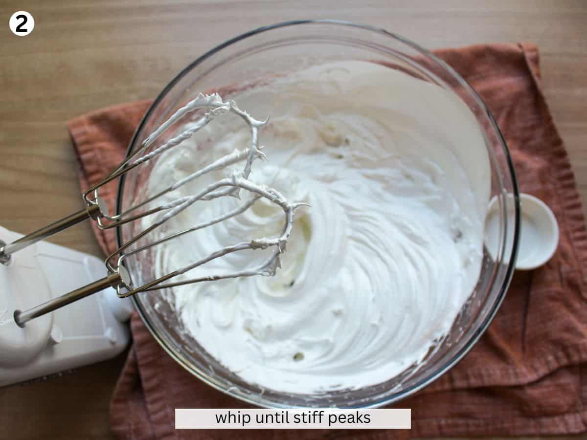 Whipping egg whites and sugar into soft stiff peaks with electric mixer in a large glass bowl. 