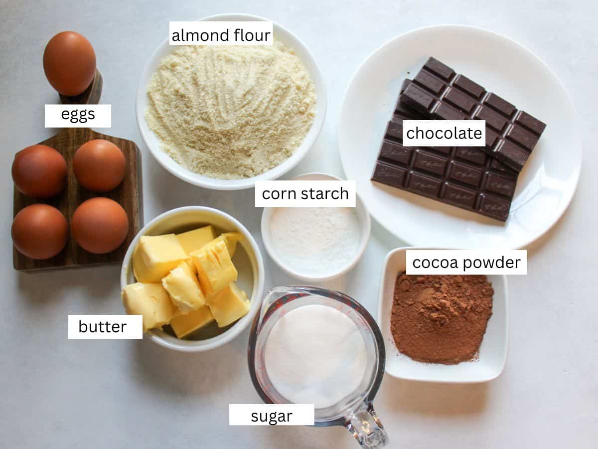 Italian chocolate almond cake ingredients on a white background. 