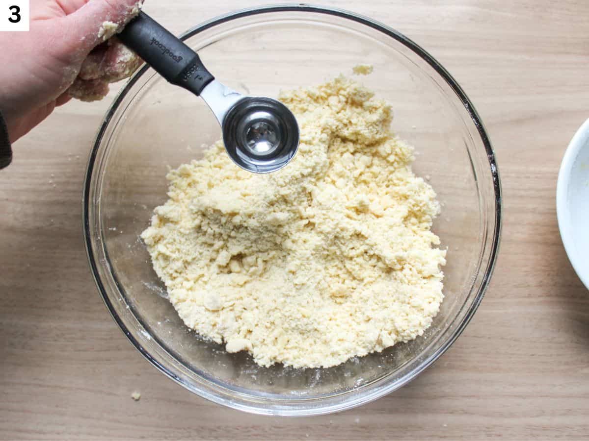 A tablespoon of cold water added to the bowl with the flour and butter mix. 