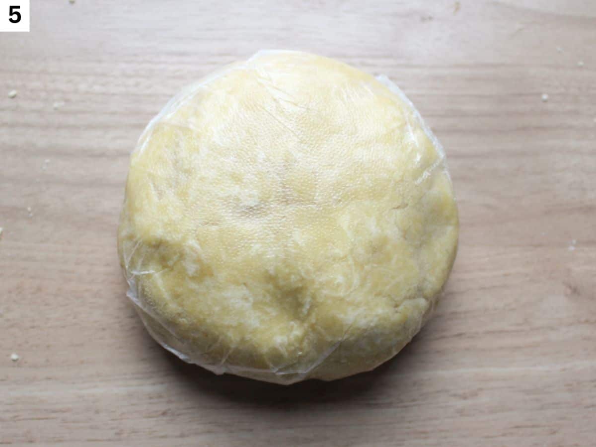 The dough wrapped into plastic wrap before chilling in the fridge.