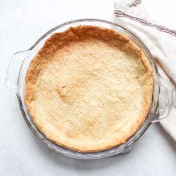 Classic French pâte brisée tart crust in a 9-inch baking pan.