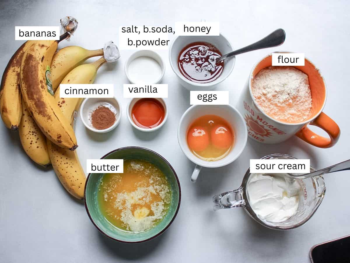 Honey banana bread ingredients on a white background. 