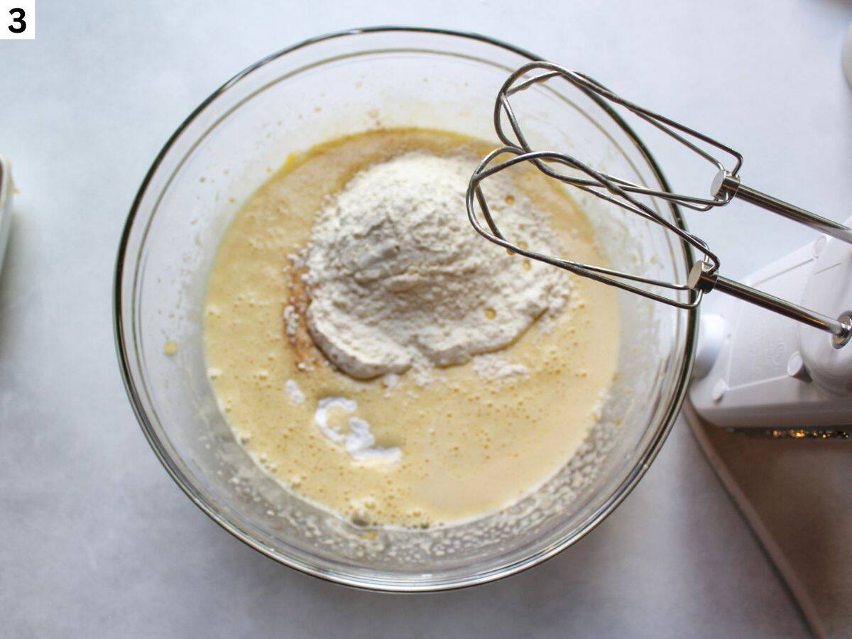 Flour and baking soda added to the wet ingredients. 