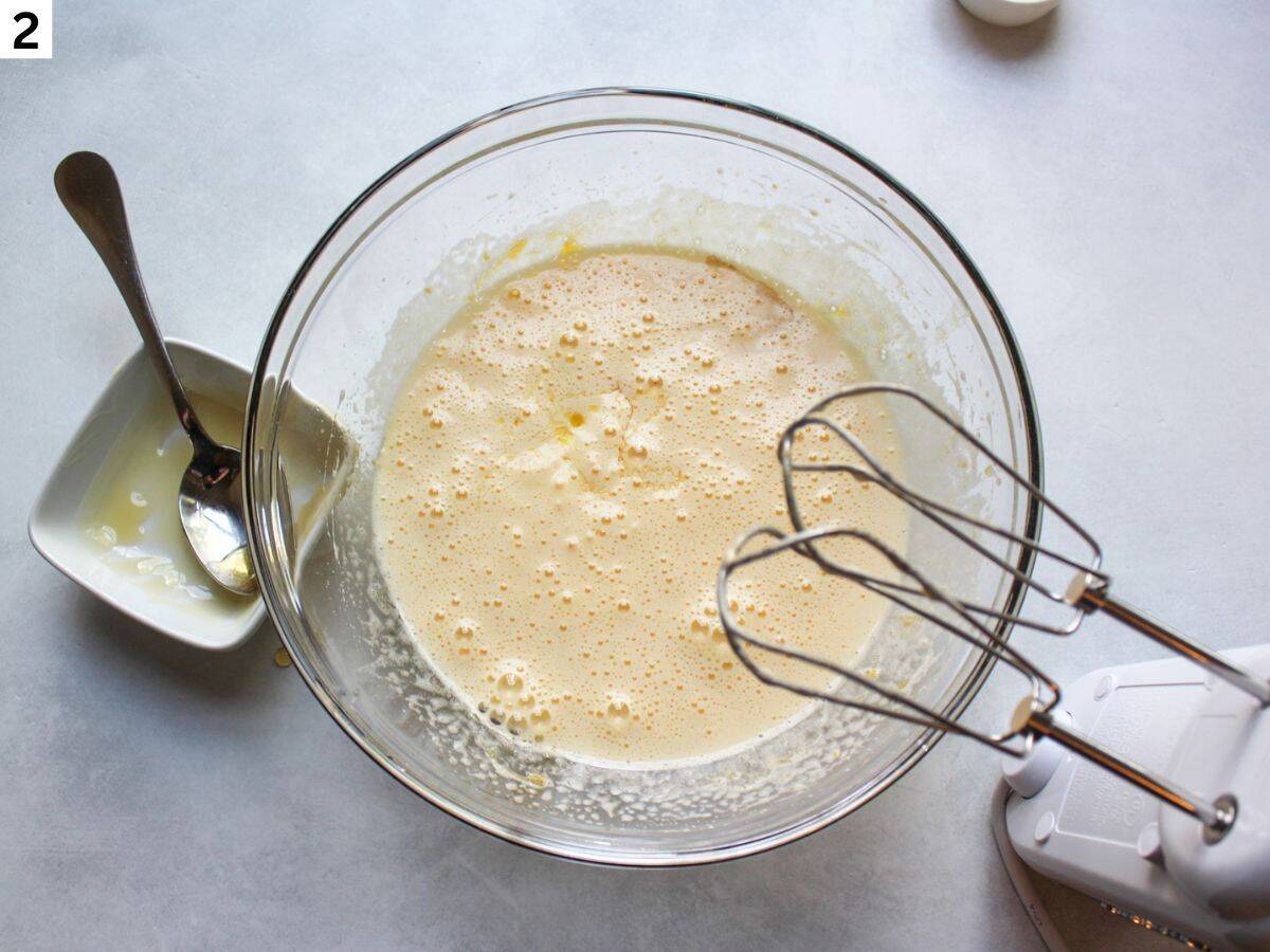 Wet ingredients added and mixed in a glass bowl. 