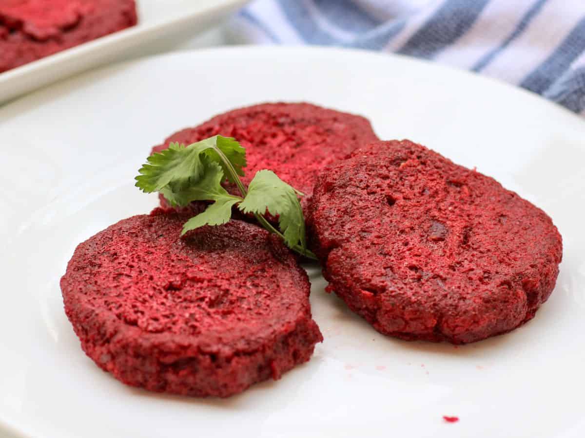 Meatless beetroot patties served on a plate. 