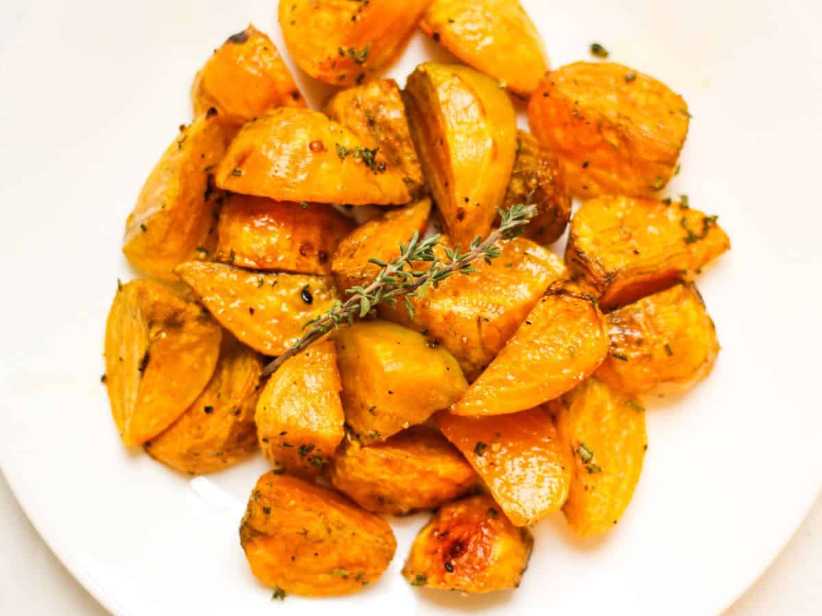 Roasted golden beets served on a plate. 
