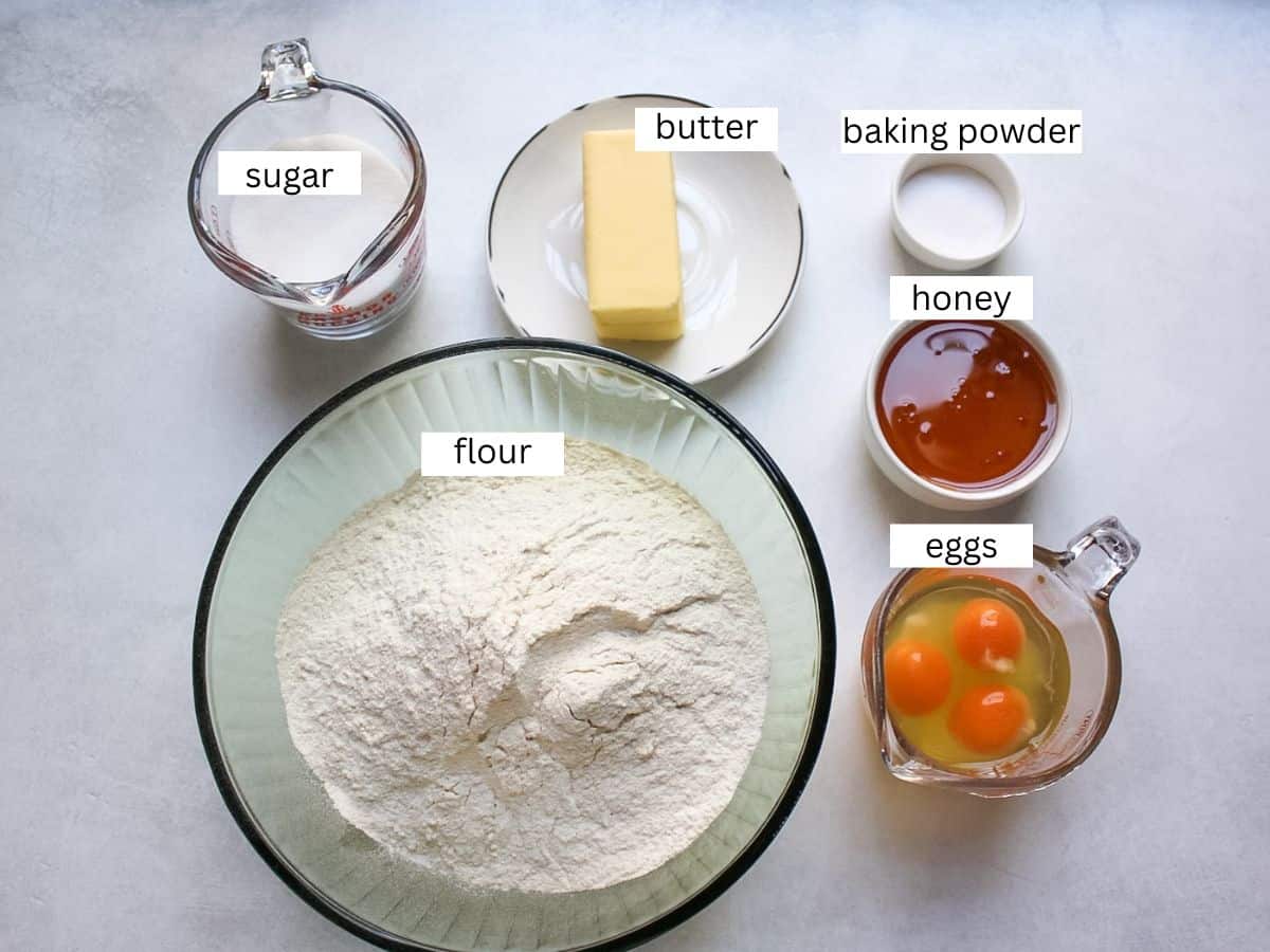 Medovik cake layers ingredients including honey, sugar, butter, baking soda, flour and eggs.
