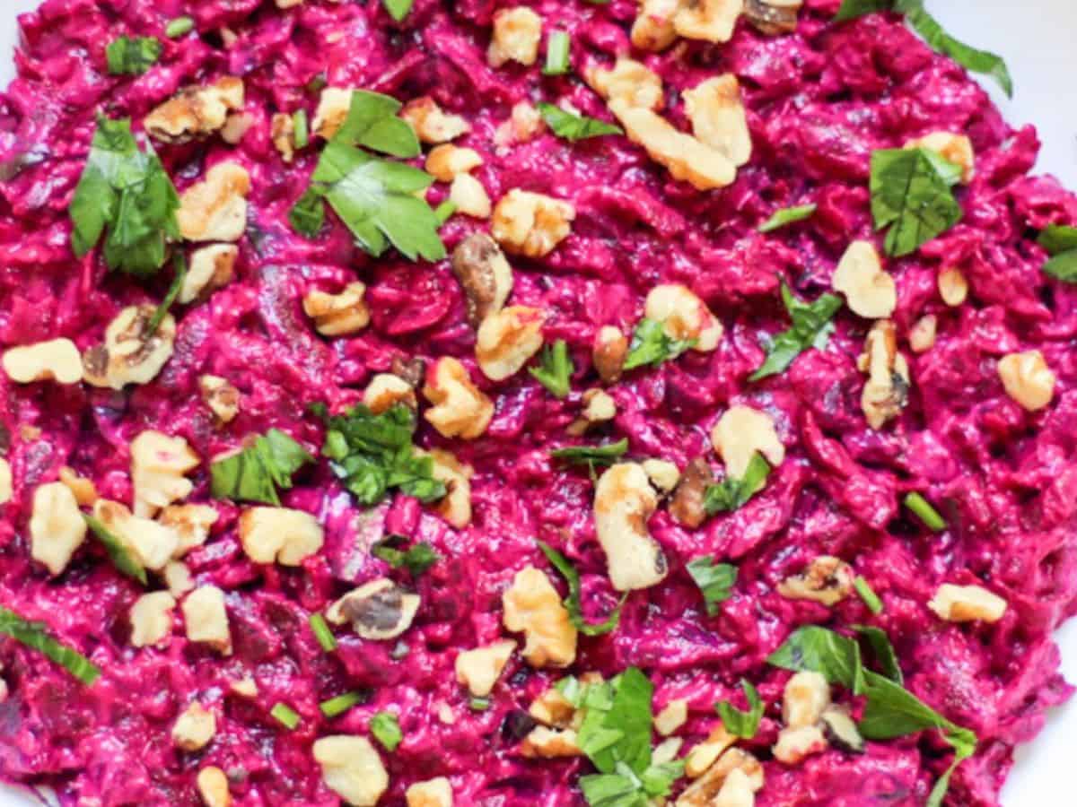 Creamy Turkish beet dip with walnuts and fresh parsley on top.  