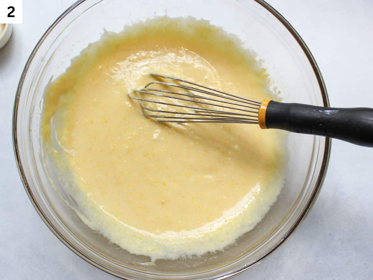 Whisked eggs, sugar, sour cream, butter and vanilla in a large mixing bowl. 