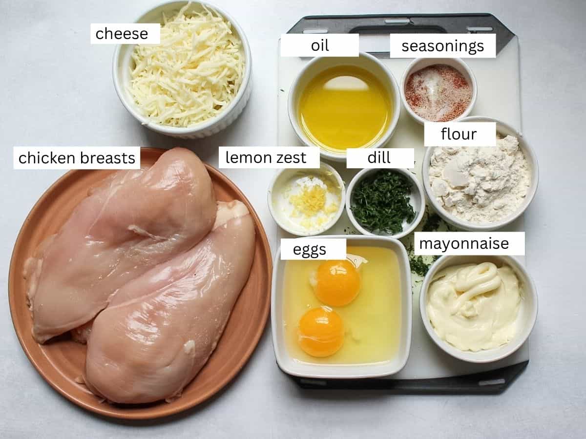 Recipe ingredients for making cheesy chicken fritters.